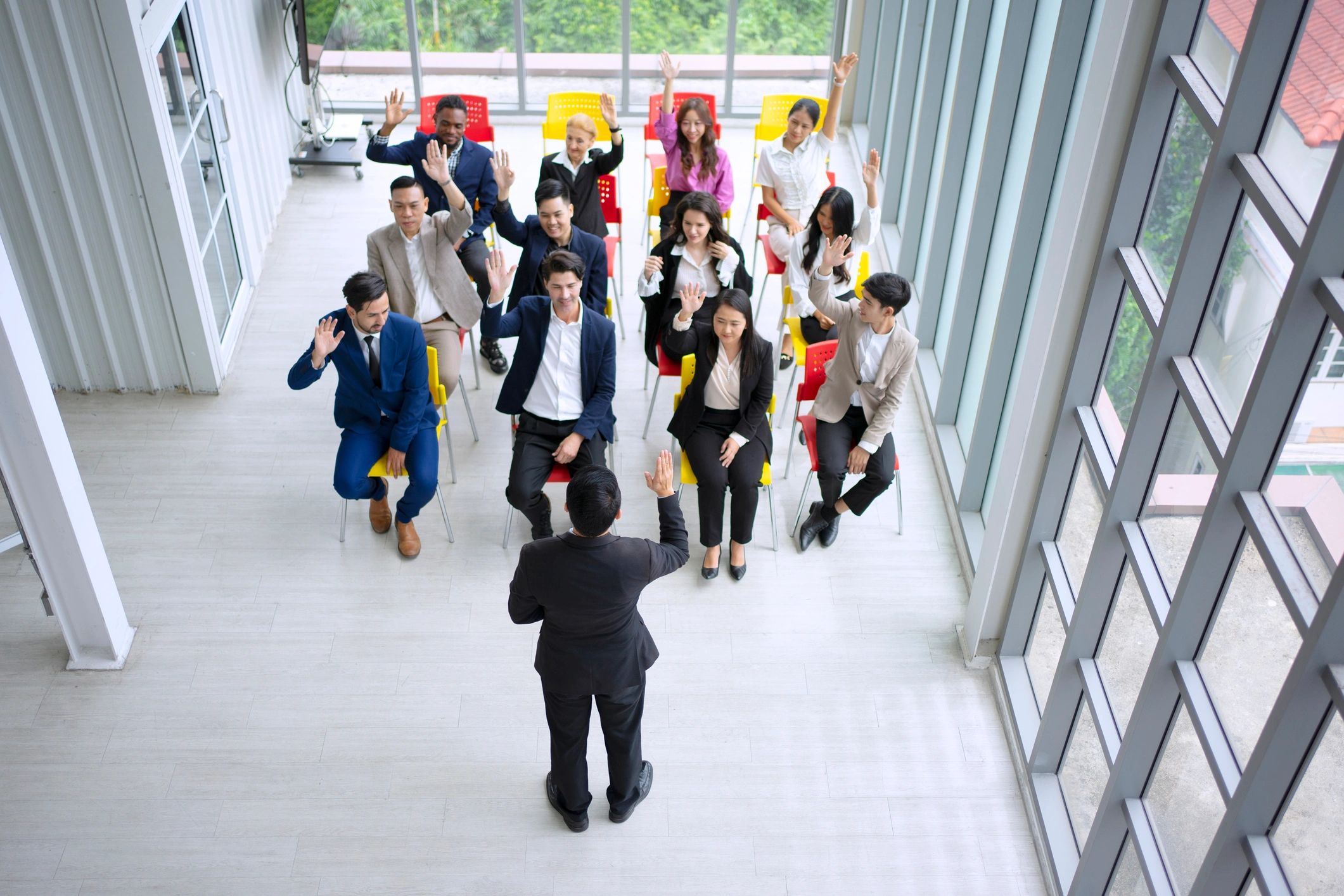 Team gathered in an energetic group meeting