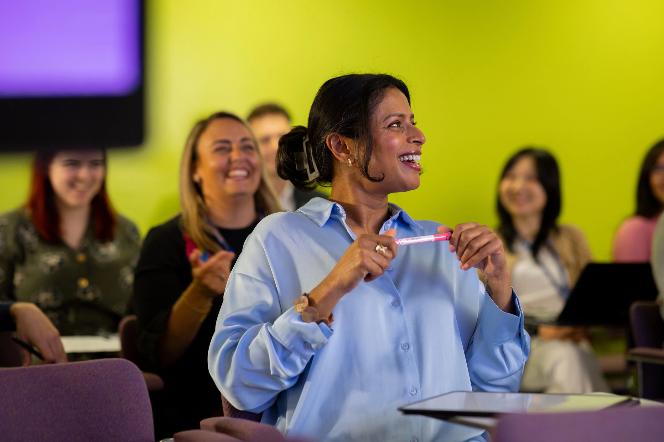 Diverse audience enjoying a seminar together