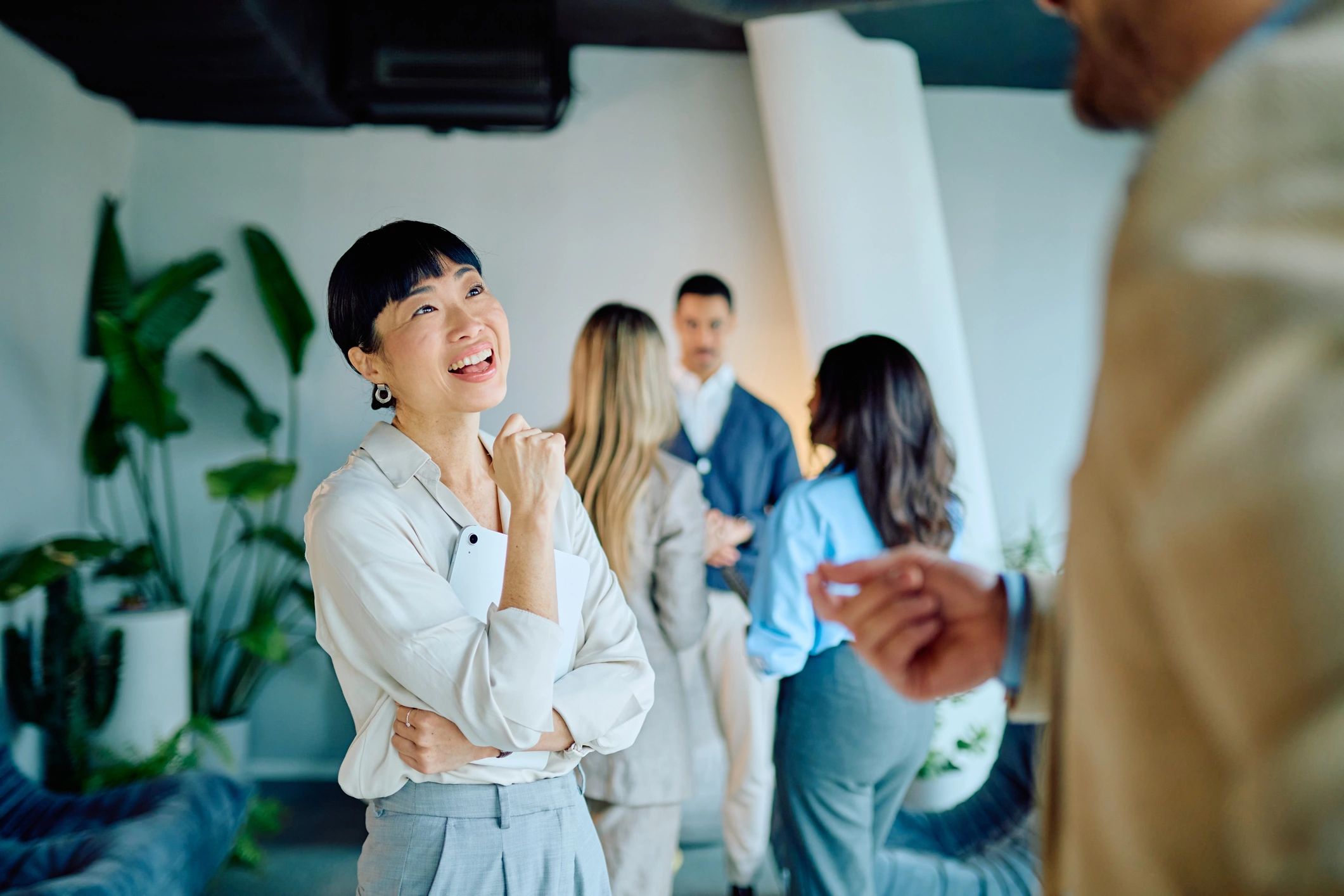 Attendee smiling during a professional networking event